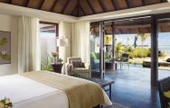 View Four Seasons Resort Mauritius at Anahita's beautiful double bedroom within stunning Mauritius.