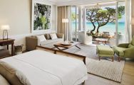 View Heritage Le Telfair Golf  Spa Resort's scenic sea view double bedroom in impressive Mauritius.