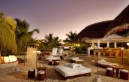 View Melia Caribe Tropical Golf  Beach Resort's lovely beach bar within striking Dominican Republic.