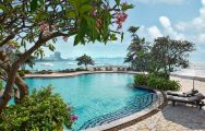 View Dusit Thani Hotel's picturesque main pool in pleasing Pattaya.