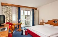 View Hotel Maximilian's comfortable double bedroom in pleasing Germany.