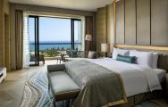 The Sofitel Sanya Leeman Resort's lovely double bedroom within dramatic China.