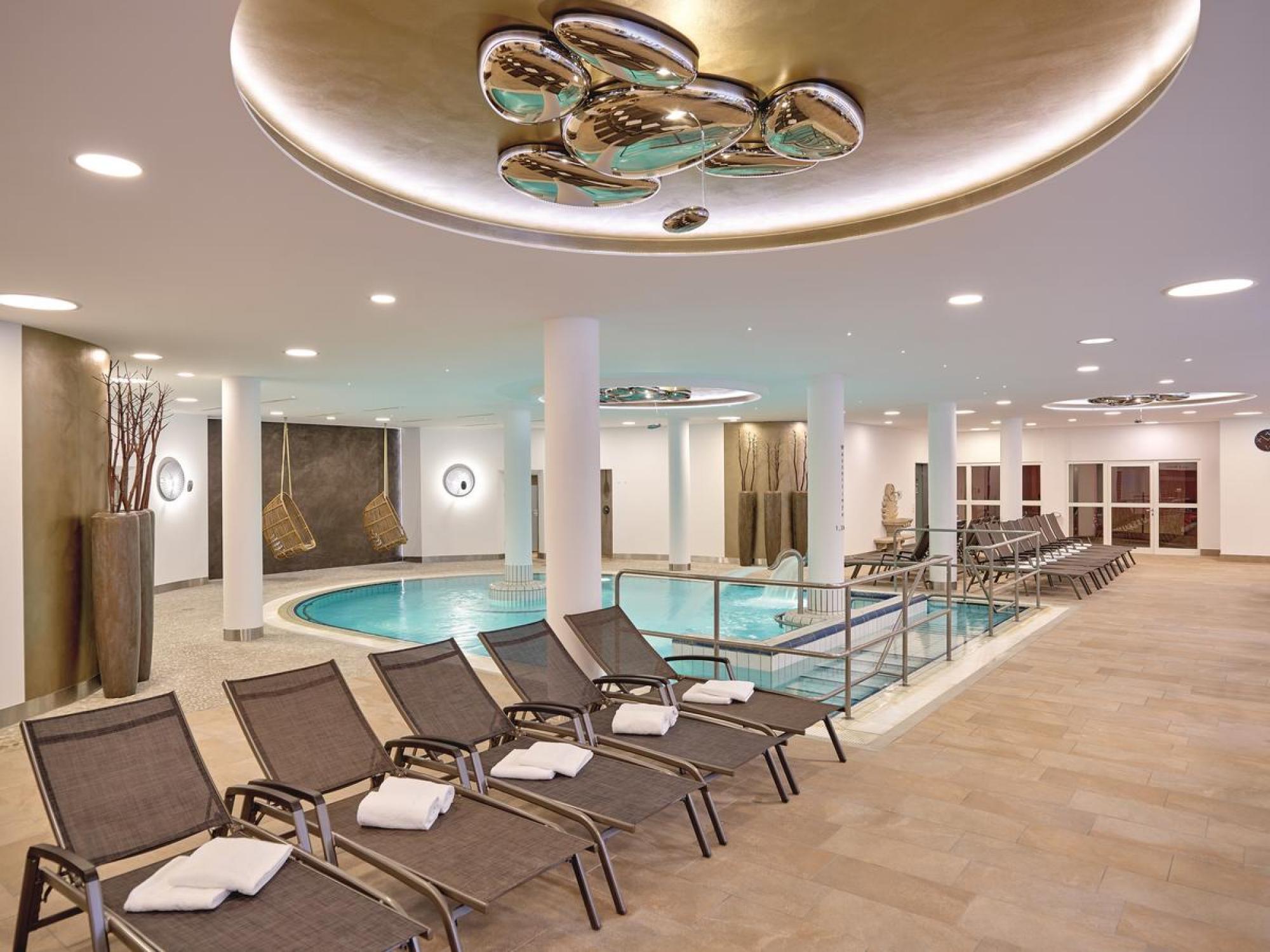View Hotel Maximilian's picturesque indoor pool within amazing Germany.