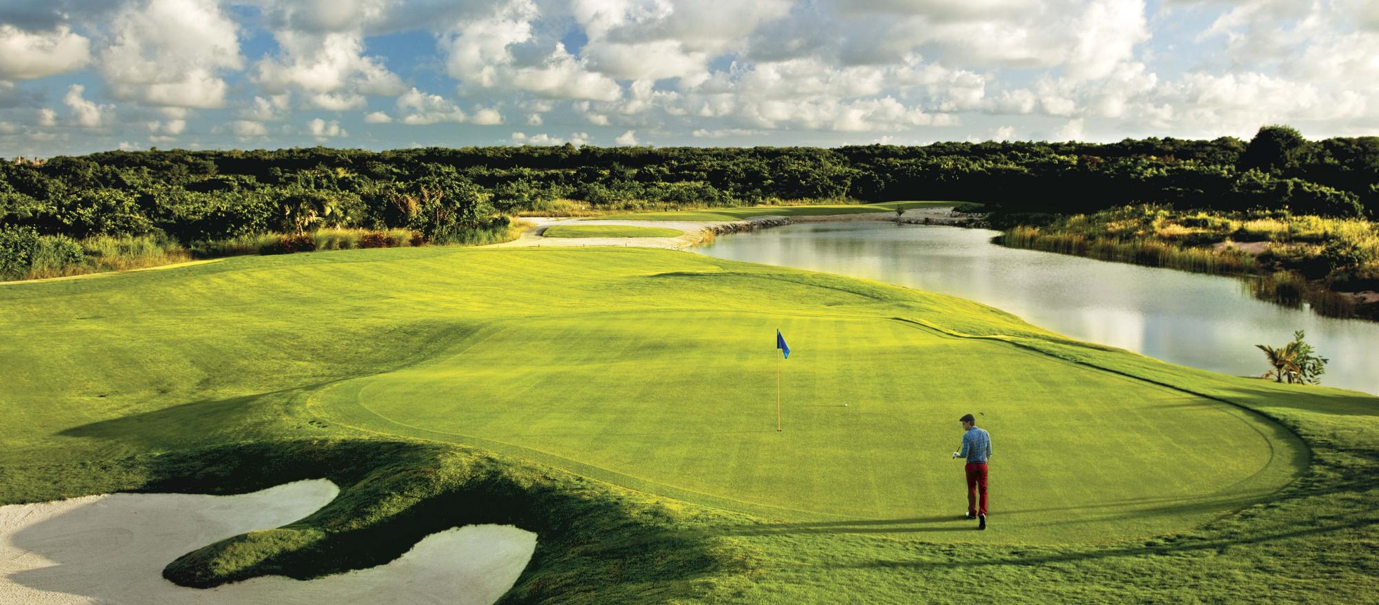 View Hard Rock Golf Club at Cana Bay's picturesque golf course within vibrant Dominican Republic.