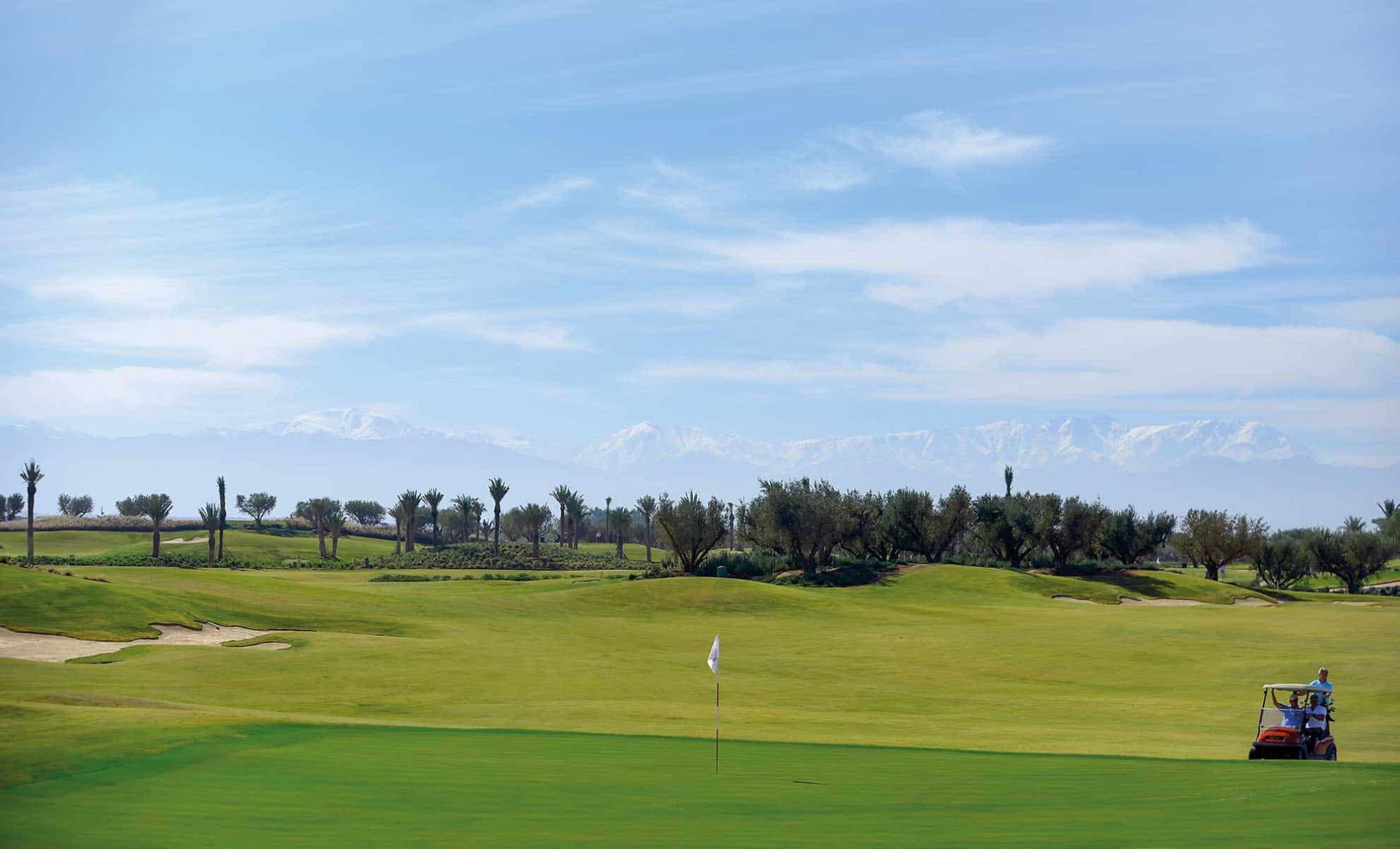 View Royal Golf Marrakech's lovely golf course within dramatic Morocco.