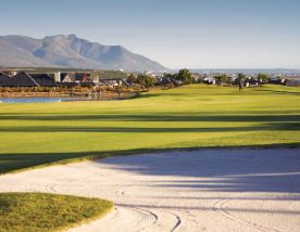 The Arabella Golf Club's picturesque golf course situated in impressive South Africa.