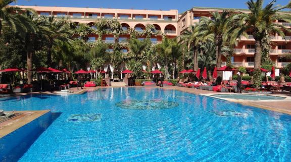 View Sofitel Marrakech Lounge  Spa Hotel's picturesque main pool within magnificent Morocco.
